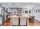 Well-lit kitchen with stainless steel appliances and a stylish island with seating at 7250 Hunters Branch Dr, Atlanta, GA 30328