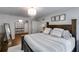 Serene main bedroom with chandelier, ample storage, closet, and relaxing ambiance at 7250 Hunters Branch Dr, Atlanta, GA 30328