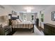 Elegant main bedroom with sophisticated furnishings, natural light, and a relaxing, inviting ambiance at 7250 Hunters Branch Dr, Atlanta, GA 30328