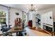 Bright home office with hardwood floors, natural light, and a functional workspace at 7250 Hunters Branch Dr, Atlanta, GA 30328
