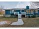 View of house and yard with elevated deck at 110 Fox Meadow Dr, Covington, GA 30016