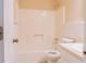 Bathroom featuring shower over tub with standard toilet and vanity at 110 Fox Meadow Dr, Covington, GA 30016