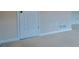 Bedroom featuring neutral walls and carpet with standard door at 110 Fox Meadow Dr, Covington, GA 30016