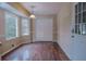 Sunny dining area with hardwood floors, white trim, and a bay window at 110 Fox Meadow Dr, Covington, GA 30016