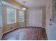 Bright dining area with hardwood floors, large windows, and closet for storage at 110 Fox Meadow Dr, Covington, GA 30016