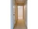 Hallway featuring neutral walls with carpeted floor and white trim at 110 Fox Meadow Dr, Covington, GA 30016