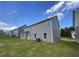 This home features gray siding, a well-maintained lawn, and a beautiful neighborhood at 117 Oliver Dr, Locust Grove, GA 30248