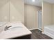 Bright bathroom featuring a sleek vanity with stone counters and modern fixtures, complemented by a shower and tub at 117 Oliver Dr, Locust Grove, GA 30248