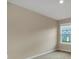 Neutral bedroom with window offering natural light and wall-to-wall carpet at 117 Oliver Dr, Locust Grove, GA 30248