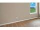 Bedroom featuring a well-lit space with carpeted floors and serene natural light from the window at 117 Oliver Dr, Locust Grove, GA 30248