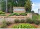 View of the decorative 'Bunn Farms' community welcome sign at 117 Oliver Dr, Locust Grove, GA 30248