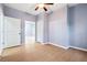 This bedroom boasts a modern ceiling fan, closet, and easy access to other rooms at 1382 Elizabeth Ln, Atlanta, GA 30344