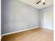 Cozy bedroom with hardwood floors, a ceiling fan, and a closet at 1382 Elizabeth Ln, Atlanta, GA 30344