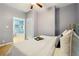 Bright bedroom with ample natural light, hardwood floors, and views of adjacent room at 1382 Elizabeth Ln, Atlanta, GA 30344