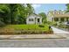 Charming two-story home with landscaped front yard and inviting front porch steps at 1382 Elizabeth Ln, Atlanta, GA 30344