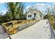 Charming home with freshly painted exterior, landscaped front yard, and concrete driveway at 1382 Elizabeth Ln, Atlanta, GA 30344