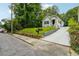 Charming home with a driveway and beautifully landscaped front yard at 1382 Elizabeth Ln, Atlanta, GA 30344