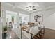 Open-concept living room seamlessly integrates with the kitchen and dining area, creating a harmonious living space at 2235 Mulsanne Dr, Lithonia, GA 30058