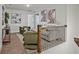 Cozy loft space with comfortable seating, stylish decor, and soft carpet at 2235 Mulsanne Dr, Lithonia, GA 30058