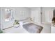 Bedroom with a daybed, beanbag chair, and access to the outside at 2304 Isla Run Run, Woodstock, GA 30188