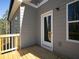 Back deck with railing and glass door entrance at 250 Shawnee Trl, Dallas, GA 30157