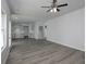 Spacious living room showcasing gray-toned flooring, neutral walls, and an open layout perfect for entertaining at 250 Shawnee Trl, Dallas, GA 30157
