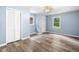 Spacious bedroom with hardwood floors, a ceiling fan, and closet at 414 Landers Sw Dr, Mableton, GA 30126