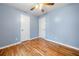 Bedroom with hardwood floors, fan and closet at 414 Landers Sw Dr, Mableton, GA 30126