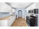 Spacious kitchen area featuring stainless steel appliances and stone countertops at 414 Landers Sw Dr, Mableton, GA 30126