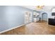 Bright kitchen features tile floors, white cabinetry, and stainless steel appliances at 414 Landers Sw Dr, Mableton, GA 30126