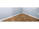 Laundry area with tile flooring and white trim against light blue walls at 414 Landers Sw Dr, Mableton, GA 30126
