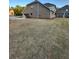 Expansive backyard with freshly laid sod, showcasing the home's exterior design and outdoor space at 5000 Fairview Cir, Villa Rica, GA 30180