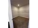 Walk-in closet with carpet flooring and wire shelving for ample storage at 5000 Fairview Cir, Villa Rica, GA 30180