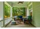 Comfortable porch with outdoor seating and serene views at 630 Cleburne Ne Ter, Atlanta, GA 30306