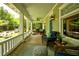 Relaxing porch with comfortable seating and stylish decor at 630 Cleburne Ne Ter, Atlanta, GA 30306