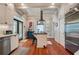 Updated kitchen with white cabinets, hardwood floors, stainless steel appliances, and a center island at 630 Cleburne Ne Ter, Atlanta, GA 30306
