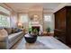 Cozy living room with a fireplace and comfortable seating at 630 Cleburne Ne Ter, Atlanta, GA 30306