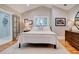 Bedroom with vaulted ceiling, natural light, and ensuite bathroom at 630 Cleburne Ne Ter, Atlanta, GA 30306