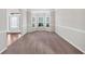 Cozy living room area with bay window that brings in lots of natural light and neutral wall color at 845 Nevis Way, Mcdonough, GA 30253
