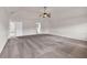 Large main bedroom with neutral wall color and carpeted floor at 845 Nevis Way, Mcdonough, GA 30253