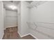 Walk-in closet featuring carpet flooring and wire shelving at 845 Nevis Way, Mcdonough, GA 30253