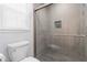 Contemporary bathroom with glass-enclosed shower and modern fixtures at 935 Old Loganville Rd, Loganville, GA 30052