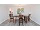 Elegant dining room featuring modern chandelier and stylish decor at 935 Old Loganville Rd, Loganville, GA 30052