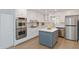 Well-equipped kitchen with stainless steel appliances and ample cabinet space at 935 Old Loganville Rd, Loganville, GA 30052