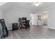 This office features a ceiling fan, closet, and a view of a bathroom and changing room at 935 Old Loganville Rd, Loganville, GA 30052
