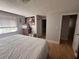 Bedroom with hardwood floors has a window and ensuite bathroom at 1425 Parkmont Dr, Roswell, GA 30076