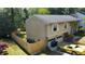 Two-story home featuring attached garage, well-maintained lawn, and a fenced backyard at 1425 Parkmont Dr, Roswell, GA 30076