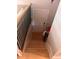 Staircase with wood steps and a black metal railing leads to the next floor at 1425 Parkmont Dr, Roswell, GA 30076