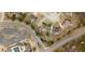 Aerial view of property highlighting landscaping, surrounding neighborhood and convenient road access at 1771 Silvergrass Ln, Grayson, GA 30017