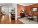 Elegant dining room with hardwood floors, decorative rug, and stylish furnishings for a great ambiance at 1771 Silvergrass Ln, Grayson, GA 30017